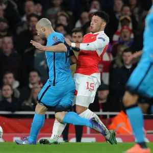Arsenal's Oxlade-Chamberlain Suffers Injury in Clash with Mascherano during Arsenal v Barcelona UCL Clash (2016) Arsenal's Oxlade-Chamberlain Suffers Injury in Clash with Mascherano during Arsenal v Barcelona UCL Clash (2016)