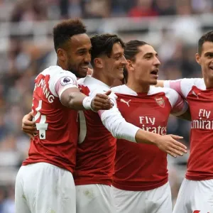 Arsenal's Ozil, Bellerin, Aubameyang, and Xhaka Celebrate Goals Against Newcastle United