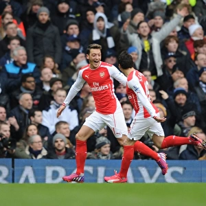 Arsenal's Ozil and Cazorla: Celebrating Glory Over Spurs in the 2015 Premier League