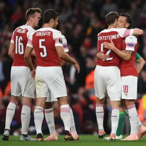 Arsenal's Ozil and Lichtsteiner: Celebrating Goals in Europa League Victory