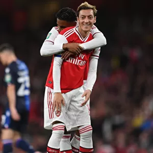 Arsenal's Ozil and Nelson in Action: Battling Nottingham Forest in Carabao Cup Clash