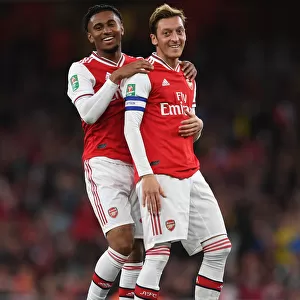Arsenal's Ozil and Nelson in Action against Nottingham Forest in Carabao Cup Third Round