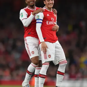 Arsenal FC Print - Ozil and Nelson in Action