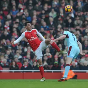 Arsenal's Ozil Outmaneuvers Burnley's Keane in Premier League Clash