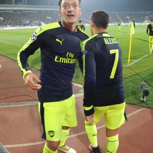 Arsenal's Ozil and Sanchez: Unstoppable Duo Celebrates Goals in Arsenal's Victory over Ludogorets (2016-17 UEFA Champions League)