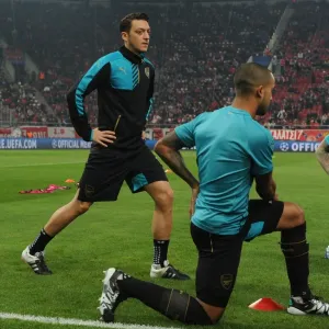 Arsenal's Ozil and Walcott Before UEFA Champions League Clash Against Olympiacos, Athens 2015 Arsenal's Ozil and Walcott Before UEFA Champions League Clash Against Olympiacos, Athens 2015