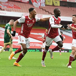 Arsenal's Pepe and Aubameyang: Celebrating Goals in Empty Emirates Stadium (2020-21)