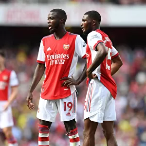Arsenal's Pepe and Maitland-Niles in Action against Norwich City (2021-22)
