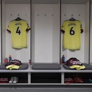 Arsenal's Pre-Match Preparation: Ben White and Gabriel's Shirts in Liverpool's Anfield Dressing Room (Liverpool v Arsenal 2021-22)