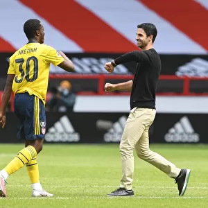 Arsenal's Quarter Final Victory: Mikel Arteta Fists Up with Eddie Nketiah after Sheffield United FA Cup Clash