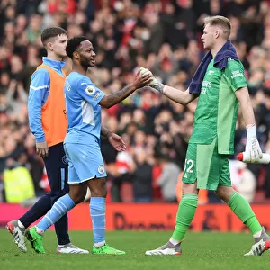 Arsenal's Ramsdale and Sterling Share a Moment After Intense Arsenal v Manchester City Clash (2021-22)