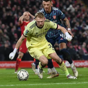 Arsenal's Ramsdale and White Go Head-to-Head in Intense Carabao Cup Semi-Final Clash Against Liverpool