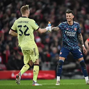 Arsenal's Ramsdale and White Lock Horns in Intense Carabao Cup Semi-Final Showdown Against Liverpool
