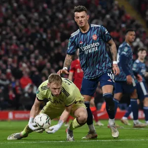 Arsenal's Ramsdale and White Lock Horns in Intense Carabao Cup Semi-Final Showdown Against Liverpool