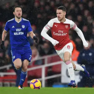 Arsenal's Ramsey Battles Arter in Premier League Clash vs. Cardiff City Arsenal's Ramsey Battles Arter in Premier League Clash vs. Cardiff City