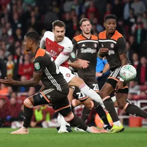 Arsenal's Ramsey Faces Off Against Brentford's Jeanvier in Carabao Cup Clash