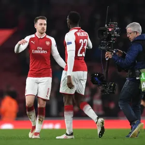 Arsenal's Ramsey and Welbeck Celebrate after Europa League Clash against AC Milan