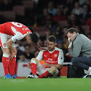 Arsenal's Ramsey and Xhaka Consulting Team Physio Lewin During Arsenal v Sunderland Match