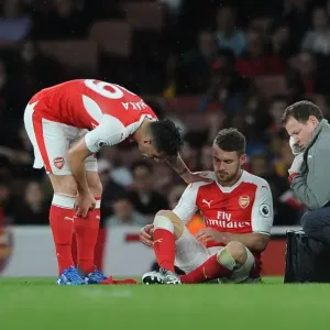 Arsenal's Ramsey and Xhaka Consulting Team Physio Lewin During Arsenal v Sunderland Match