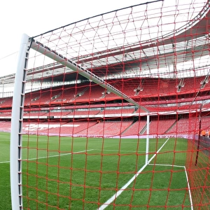 Arsenal's Red Nike Goalnets: Lace Up Save Lives in Action during Manchester United Match