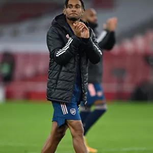 Arsenal's Reiss Nelson Celebrates Europa League Victory with a Clap for the Fans