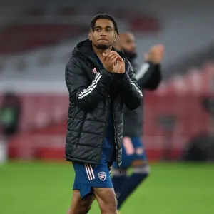 Arsenal's Reiss Nelson Celebrates Europa League Victory with a Clap for the Fans