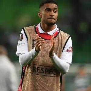 Arsenal's Reiss Nelson Celebrates Europa League Victory with Fans