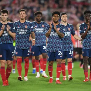 Arsenal's Reiss Nelson Celebrates with Fans after Brentford Victory - 2021-22 Premier League Arsenal's Reiss Nelson Celebrates with Fans after Brentford Victory - 2021-22 Premier League