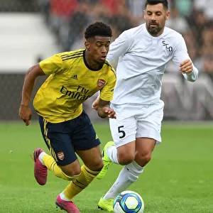 Arsenal's Reiss Nelson Faces Off Against Angers Thomas Mangani in 2019 Pre-Season Friendly