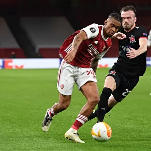 Arsenal's Reiss Nelson Goes Head-to-Head with Dundalk's Cameron Dummigan in Empty Emirates Stadium - UEFA Europa League 2020-21