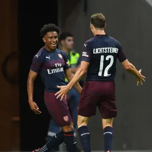 Arsenal's Reiss Nelson and Stephan Lichtsteiner Celebrate Goal Against SS Lazio in Stockholm Pre-Season Friendly, 2018 Arsenal's Reiss Nelson and Stephan Lichtsteiner Celebrate Goal Against SS Lazio in Stockholm Pre-Season Friendly, 2018