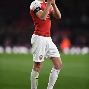 Arsenal's Rob Holding Celebrates with Fans after Arsenal vs Liverpool Match
