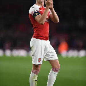 Arsenal's Rob Holding Celebrates with Fans after Arsenal vs Liverpool Match Arsenal's Rob Holding Celebrates with Fans after Arsenal vs Liverpool Match