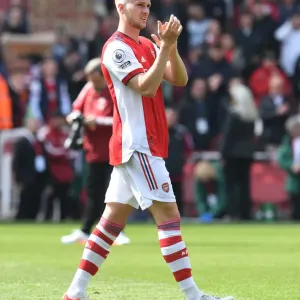 Arsenal's Rob Holding Celebrates with Fans after Victory over Manchester United (2021-22) Arsenal's Rob Holding Celebrates with Fans after Victory over Manchester United (2021-22)
