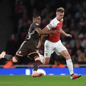 Arsenal's Rob Holding Clashes with Brentford's Ezri Konsa in Carabao Cup Showdown Arsenal's Rob Holding Clashes with Brentford's Ezri Konsa in Carabao Cup Showdown