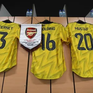 Arsenal's Rob Holding Displays Europa League Pennant Before Vitoria Guimaraes Match Arsenal's Rob Holding Displays Europa League Pennant Before Vitoria Guimaraes Match