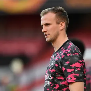 Arsenal's Rob Holding: Pre-Match Focus at Empty Emirates Stadium - UEFA Europa League Semi-Final (2021) Arsenal's Rob Holding: Pre-Match Focus at Empty Emirates Stadium - UEFA Europa League Semi-Final (2021)