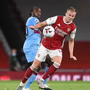 Arsenal's Rob Holding Wins the Ball from West Ham's Michail Antonio in 2020-21 Premier League Clash
