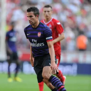 Arsenal's Robin van Persie in Action: Pre-Season Clash against Cologne (2012)