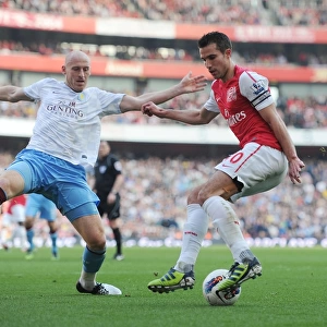 Arsenal's Robin van Persie Clashes with Aston Villa's James Collins in Premier League Showdown