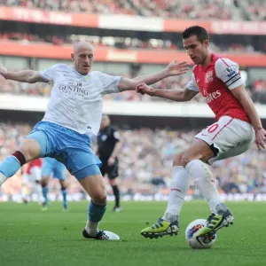 Arsenal's Robin van Persie Clashes with Aston Villa's James Collins in Premier League Showdown
