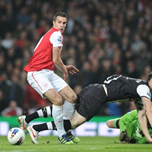 Arsenal's Robin van Persie Clashes with Newcastle's Mike Williamson and Tim Krul during the 2011-12 Premier League Match