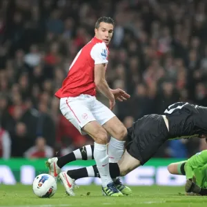 Arsenal's Robin van Persie Clashes with Newcastle's Mike Williamson and Tim Krul during the 2011-12 Premier League Match Arsenal's Robin van Persie Clashes with Newcastle's Mike Williamson and Tim Krul during the 2011-12 Premier League Match