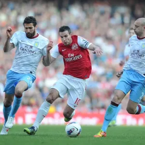 Arsenal's Robin van Persie Goes Head-to-Head with Aston Villa's Carlos Cuellar and Alan Hutton
