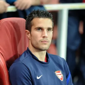 Arsenal's Robin van Persie Scores the Winning Goal Against Olympiacos in the UEFA Champions League at Emirates Stadium (2011-12)