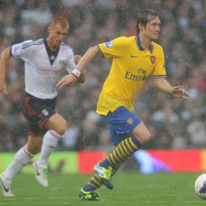 Arsenal's Rosicky in Action against Fulham (2013-14 Premier League) Arsenal's Rosicky in Action against Fulham (2013-14 Premier League)