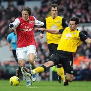 Arsenal's Rosicky Clashes with Blackburn's Dann in Premier League Showdown