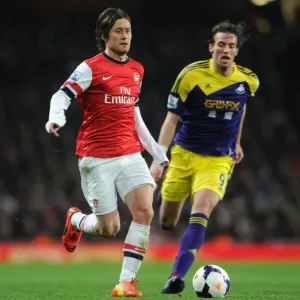 Arsenal's Rosicky Clashes with Swansea's Michu in Premier League Showdown