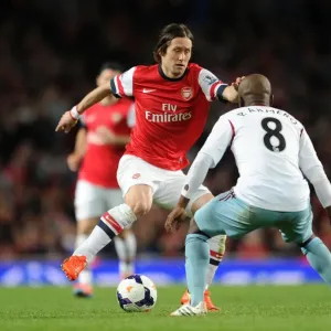 Arsenal's Rosicky Clashes with West Ham's Armero in Premier League Showdown Arsenal's Rosicky Clashes with West Ham's Armero in Premier League Showdown