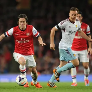 Arsenal's Rosicky Clashes with West Ham's Noble in Premier League Showdown Arsenal's Rosicky Clashes with West Ham's Noble in Premier League Showdown